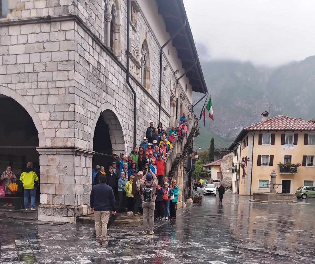 Austrian tourists on steps of Venzone Municipio 6 May 2026